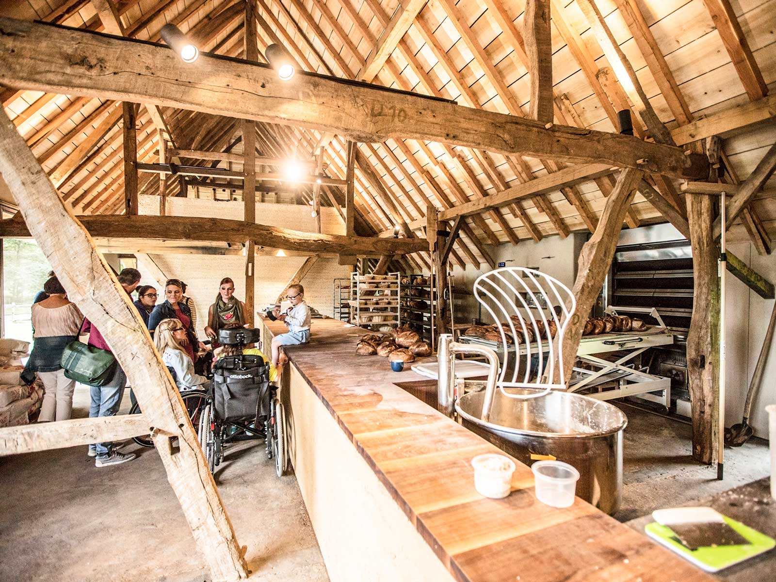 Openluchtmuseum Bokrijk med brödbak på bild.