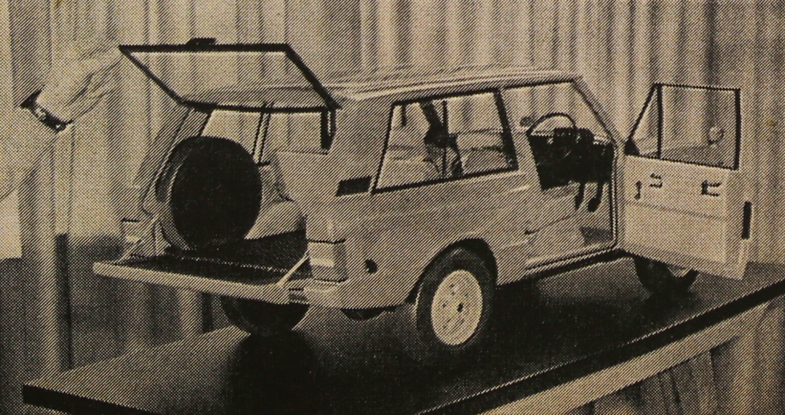 Range Rover i kvartsskala.