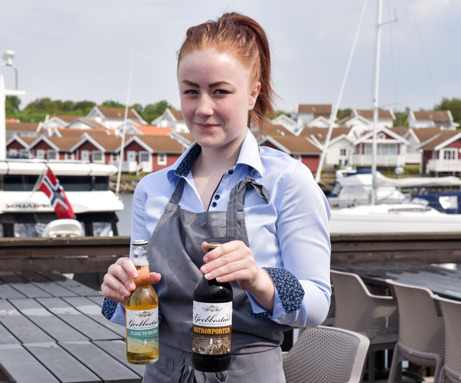 Linnea visar oss Grebbestads lokala öl som passar till skaldjur. Ett ljust öl och en porter.