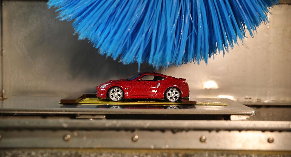 Nissan har en miniatyrbiltvätt